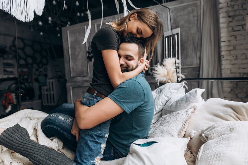 woman hugging man with increased strength